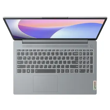 Lenovo IdeaPad Slim 3 15IAH8 top-down view showing full backlit keyboard with numeric keypad and precision touchpad